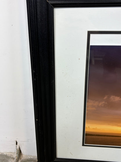 Fotografía marcada con Paspartu y un Marco negro