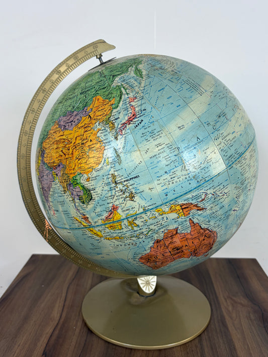Globo terráqueo azul con relieve de la marca Repogle